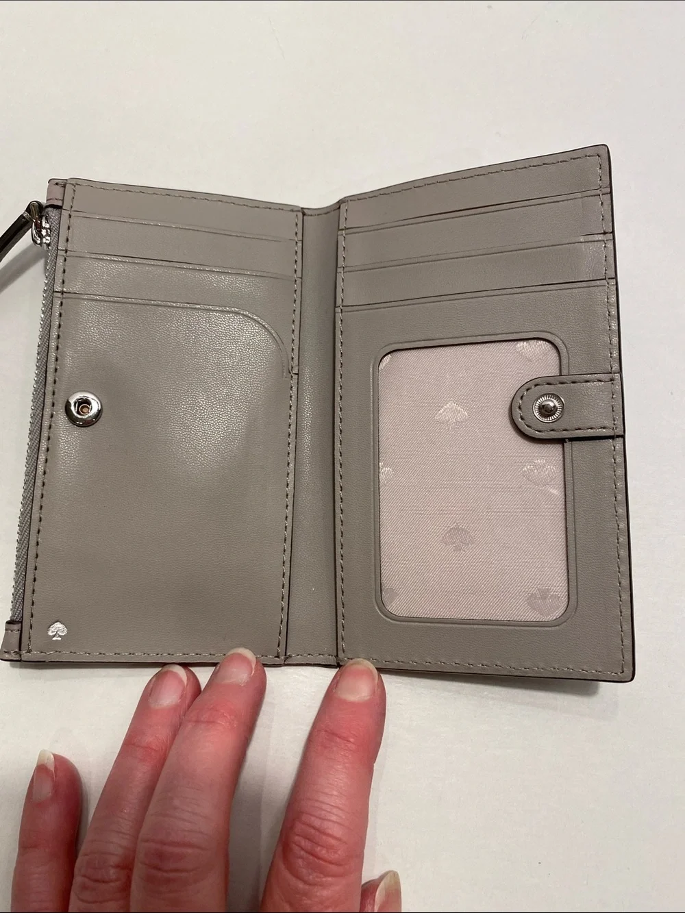 kate spade New York pebble leather card holder NWOT. Gray